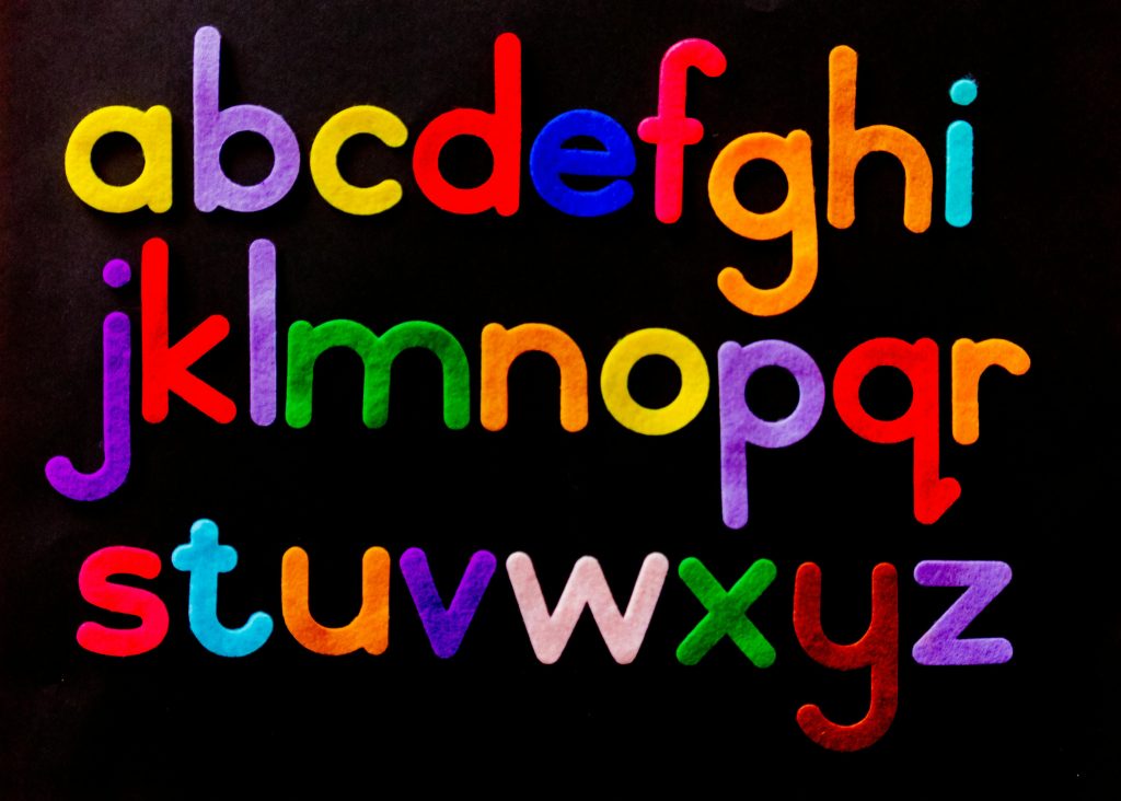 Alphabet Letter Text on Black Background